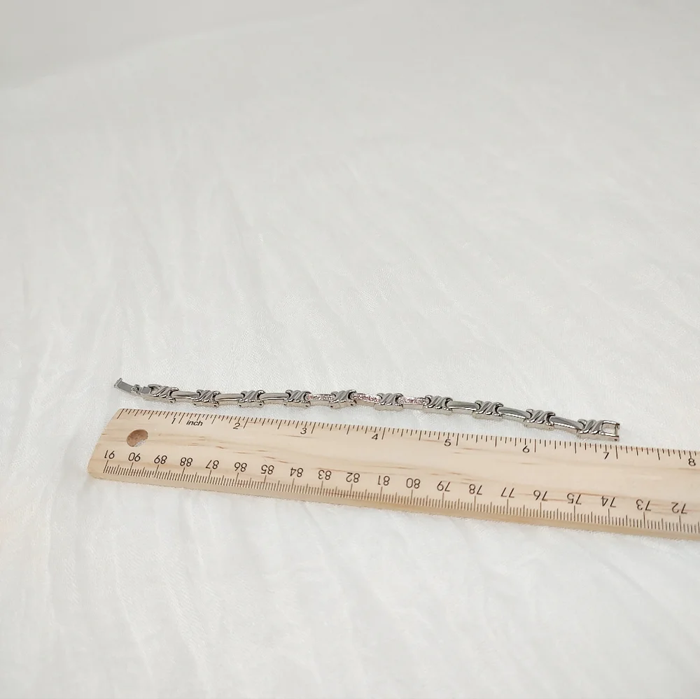 Silver bracelet with tiny pink crystals